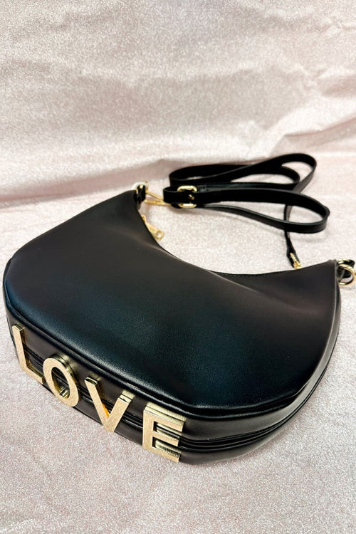 Laukku LOVE. Ihana tekstiilinahkainen laukku Hauska LOVE-teksti laukun pohjassa Mitat 23 x 9 x 16cm Materiaali Synteettinen